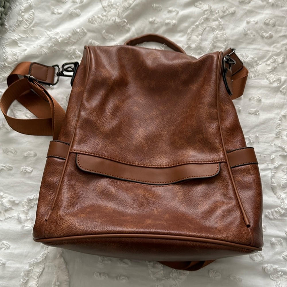 Brown back closing backpack
